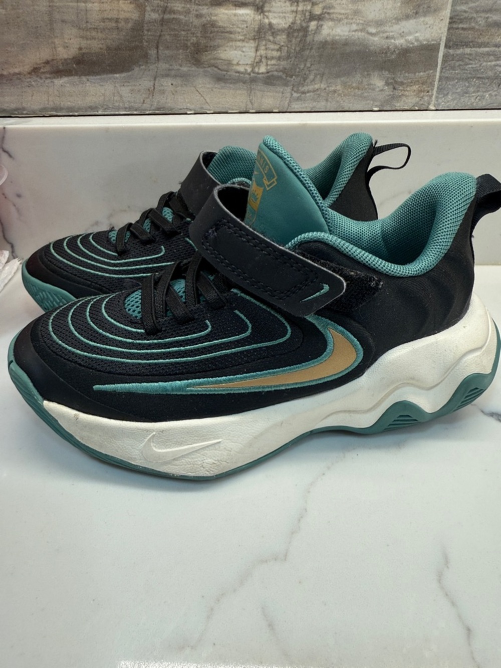 Nike little kids Black & Teal Athletic Sneakers with Gold Accent